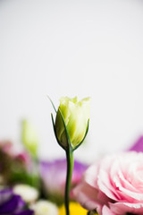 Bouquet with a lot of different flower on the wooden background. Shallow depth of field.