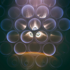 background of colorful big plastic pipes used at the building site.