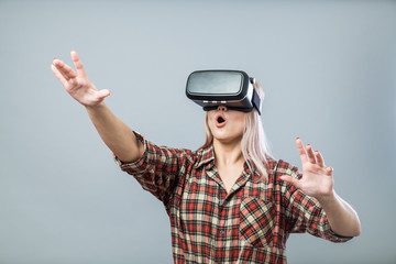 Cheerful woman with vr headset