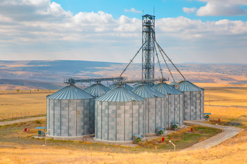 Obraz premium Agricultural Silos, Storage and drying of grains, wheat, corn, soy, sunflower