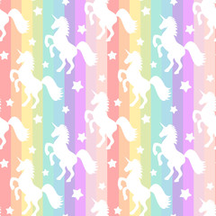 Obraz na płótnie Canvas cute white unicorns silhouette on rainbow colorful stripes seamless vector pattern background illustration