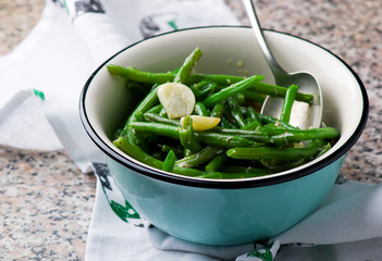 braised green beans with garlic. selective focus