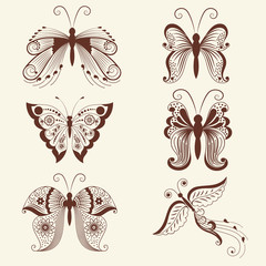 Vector illustration of butterflies in mehndi ornament. Traditional indian style, ornamental floral elements for henna tattoo, stickers, mehndi and yoga design, cards and prints.