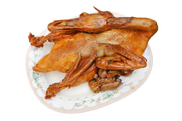 Roasted Duck on plate isolated on white background