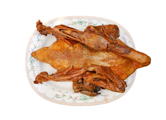 Roasted Duck on plate isolated on white background