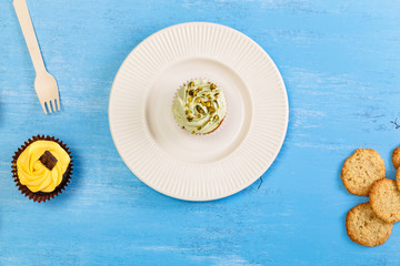 Cupcakes with buttercream. Pistachio cream.