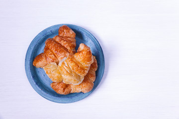 Fresh croissants. Delicious buttered roll.