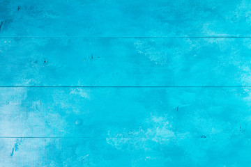 Bright aqua blue wooden background texture macro
