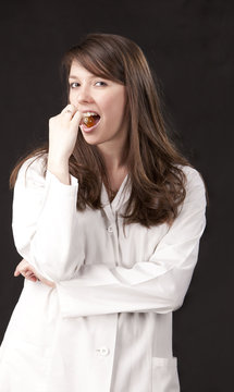 Photo of a young doctor in a white coat