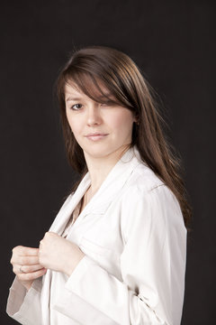 Photo of a young doctor in a white coat