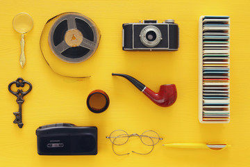 top view image of old camera, film and tape recorder