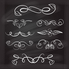 Vector calligraphic design elements set on a chalkboard background