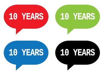 10 YEARS text, on rectangle speech bubble sign.