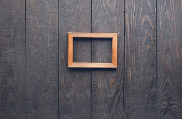 photo frame on old wooden wall