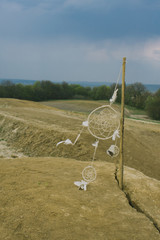 dream catcher hanging  in a dry land