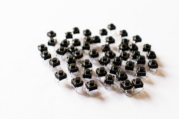 Group of Momentary Push Button Switch. Set of buttons for prototyping application. Electronics component.