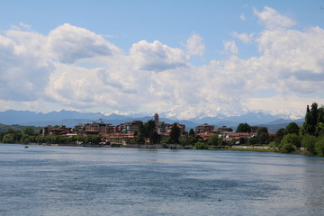 Fototapeta na wymiar Sesto Calende and Alps panoramic view from the River Ticino, Italy