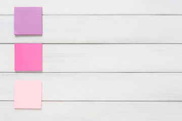 Stationery supply - sticky notes paper on wood