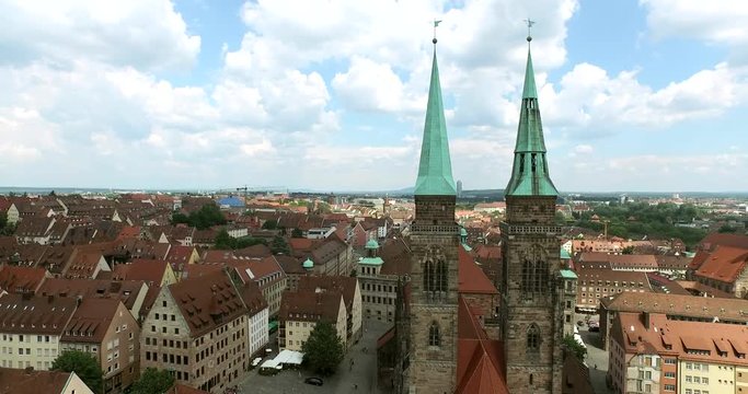 Flying to the Sebalduskirche.  The camera approaches slowly the iconic church in Nuremberg, Germany.