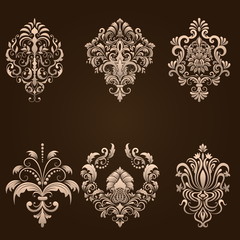 Vector set of damask ornamental elements. Elegant floral abstract elements for design. Perfect for invitations, cards etc.