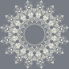 Vector ornamental round lace with damask and arabesque elements. Mehndi style. Orient traditional ornament. Zentangle-like round colored floral ornament.