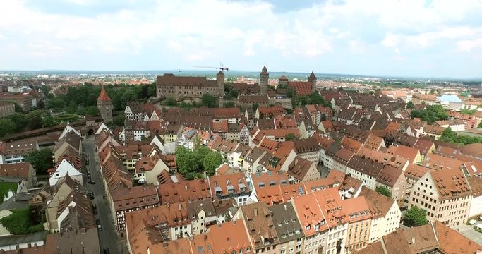 A castle in Bavaria. Aerial shot over Nuremberg, Germany on a sunny day. The old town can be seen behind its walls.