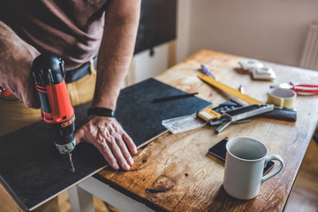 Man working with power drill