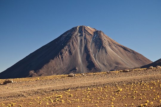 View of Licancabur Volcano on the border between Chile and Bolivia. This volcanic peak sprouted overnight from the surface of the desert. Chile. South America