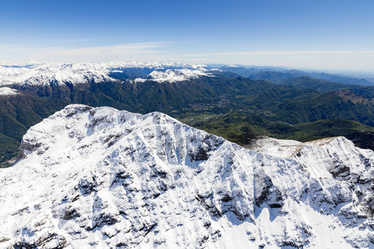 Aerial view of the snowy ridges of the Grignone mountain and Valsassina Lecco Province Lombardy Italy Europe