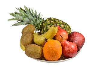 Dish with tropical whole fruits: pineapple, bananas, kiwi, oranges, pears, apples. Isolated on white background