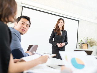 Business woman having presentation in conference