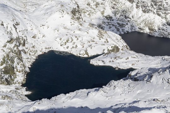 Aerial view of the blue alpine lakes framed by snowy peaks Truzzo Valley Spluga Valley Valtellina Lombardy Italy Europe