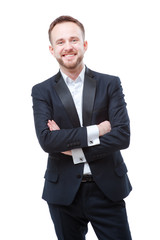 Smiling young man keeping arms crossed