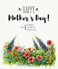 Fototapeta premium Greeting card Happy Mother's Day with lawn of wild flowers and lettering. Watercolor card on textured paper