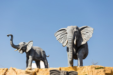 Sculpture of jungle animals. Two elephants
