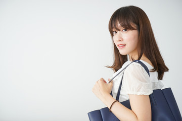 Young woman walking with casual wear