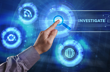 Business, Technology, Internet and network concept. Young businessman working on a virtual screen of the future and sees the inscription: Investigate