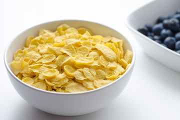 Breakfast cereal cornflakes on white background