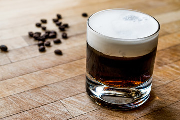White Russian Cocktail with coffee beans.