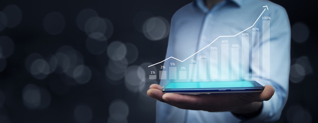Businessman hand phone with pressing business graph