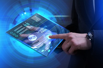 Business, Technology, Internet and network concept. Young businessman working on a virtual screen of the future and sees the inscription: Landing page