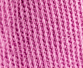 pink fabric as a background. macro