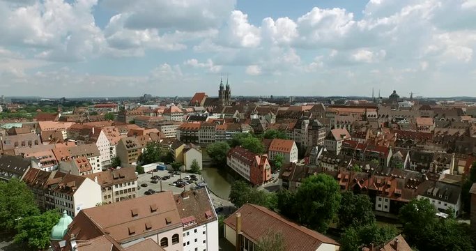 Nürnberg and the church Lorenz. The camera flies over the Pegnitz to the church Lorenz. Aerial shot of Nuremberg.