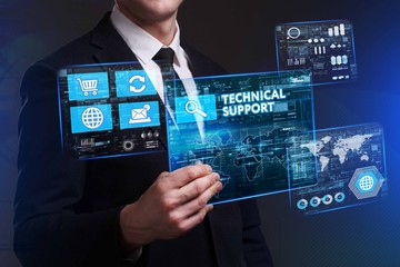 Business, Technology, Internet and network concept. Young businessman working on a virtual screen of the future and sees the inscription: Technical support