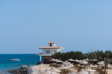 Fototapeta premium Hotel resort place with wicker umbrellas