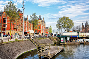 Canal on Open Havenfront in Amsterdam