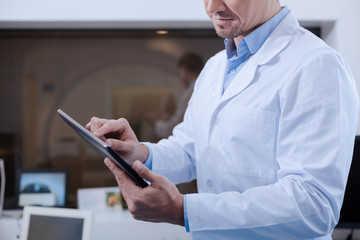 Modern tablet being used by a doctor