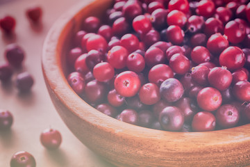 Cranberry in a wooden bowl