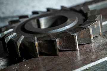 metal working. Process of tooth gear wheel finish machining by cutter tool at factory