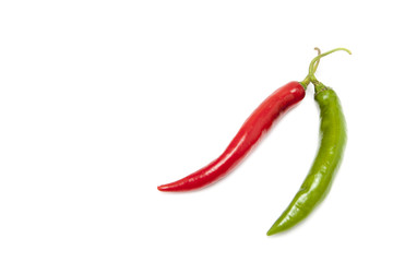 Two chilis and two color on white background